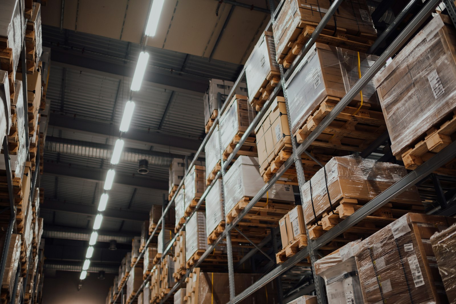 Securely wrapped pallets stored on warehouse racking